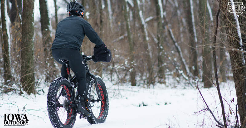 Conquer winter on a fat bike! These heavy-duty bikes sport tires near 4 inches wide, which allows them to go where most road and mountain bikes can’t. The oversized tires’ extra surface area gives the bike traction on mud, snow, sand and other slippery surfaces, and the inflation can be adjusted to absorb impact. | Iowa DNR